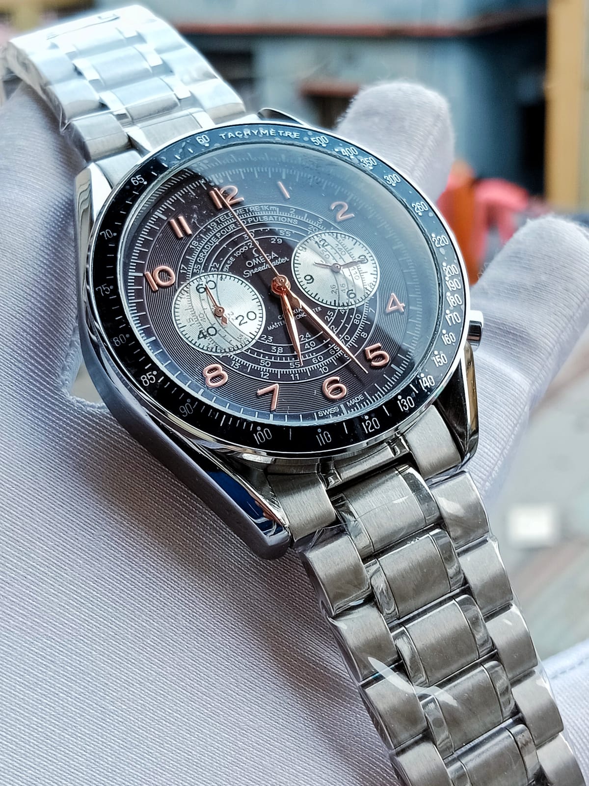 Omega silver brown