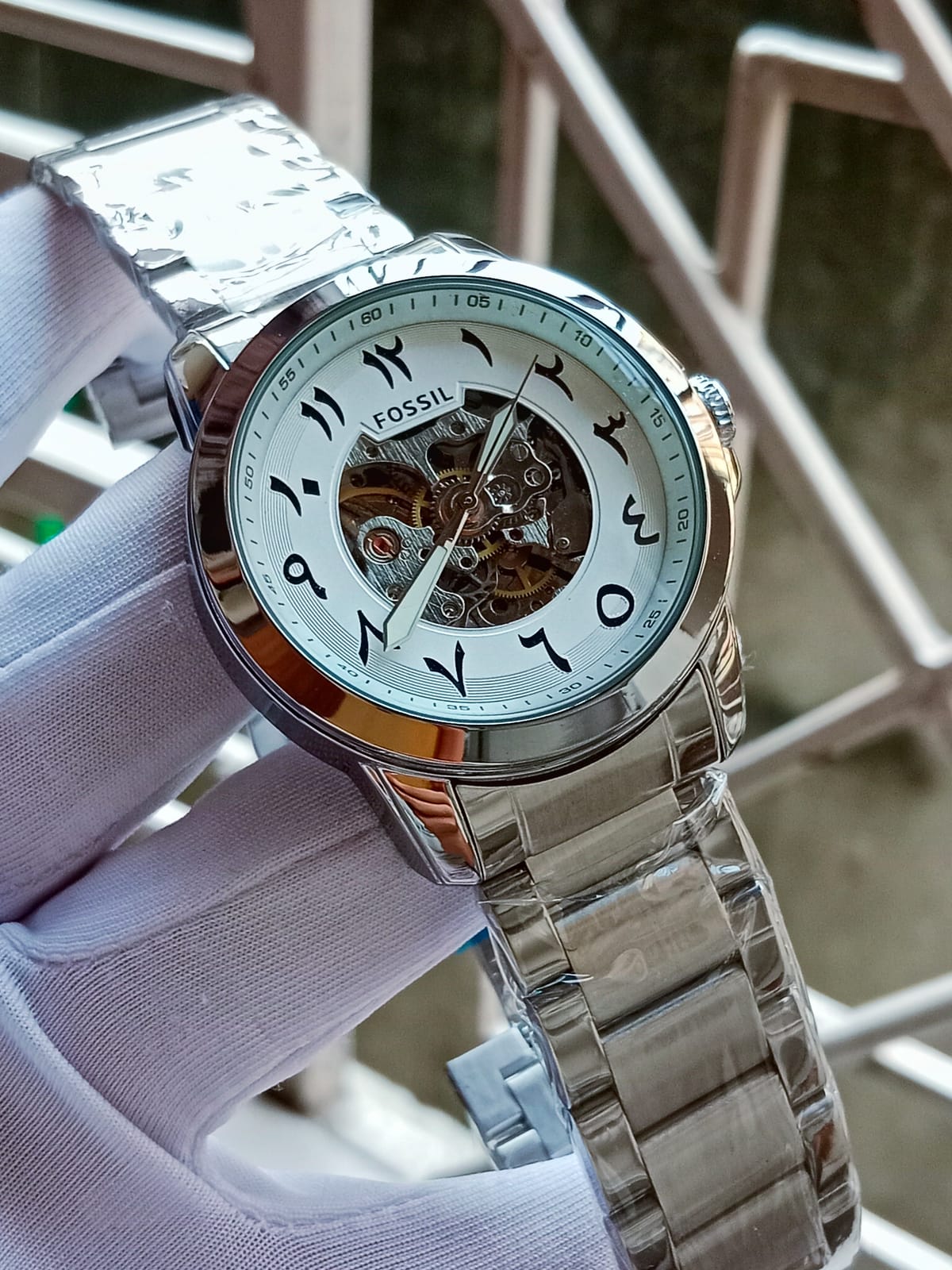 Fossil Arabic silver white